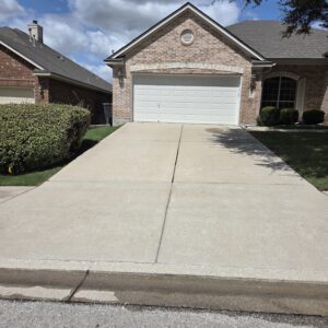 Driveway cleaning in Austin, TX after pressure washing service